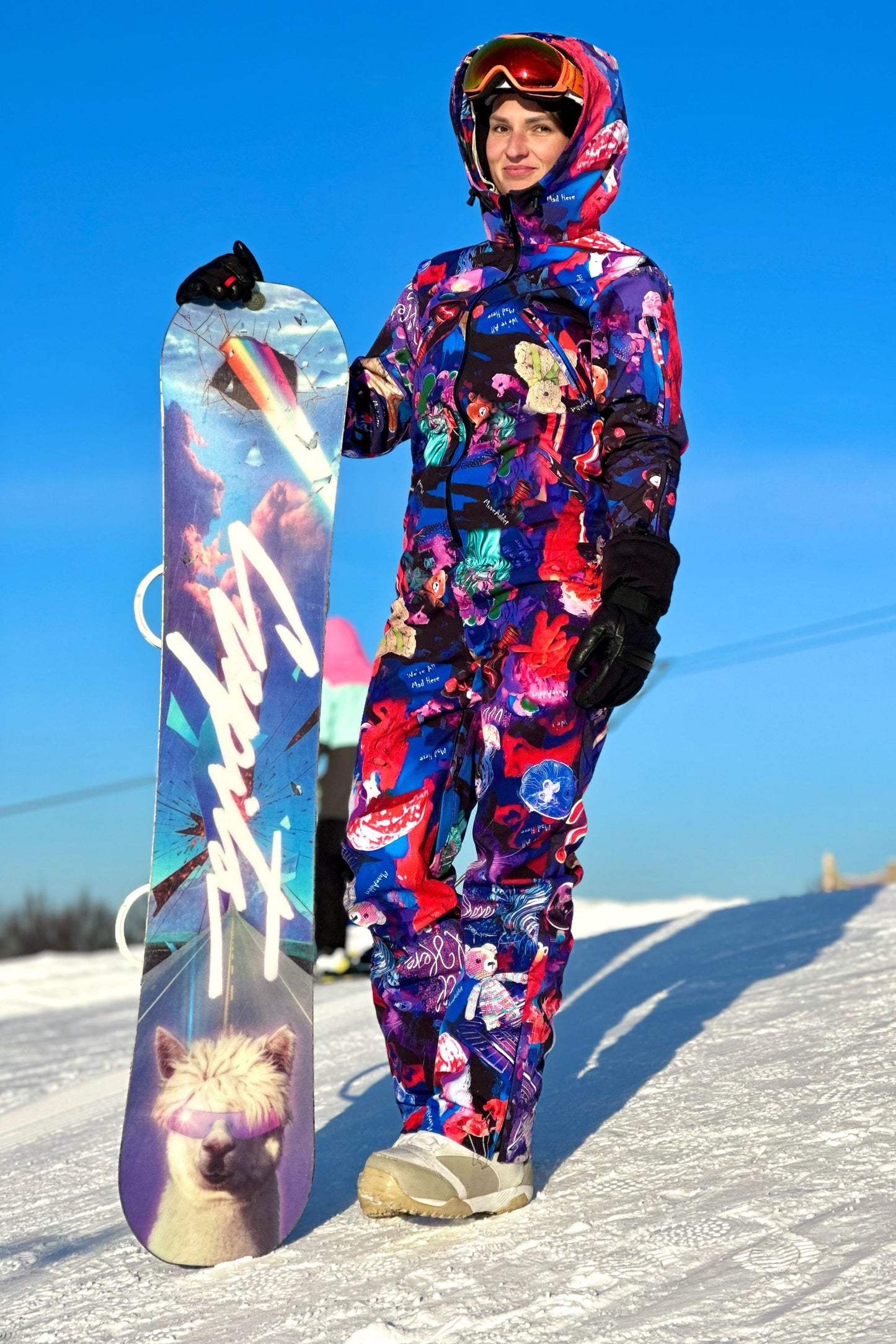 Sieviešu ziemas slēpošanas/snovborda kombinezons ar krāsainu violetu apdruku