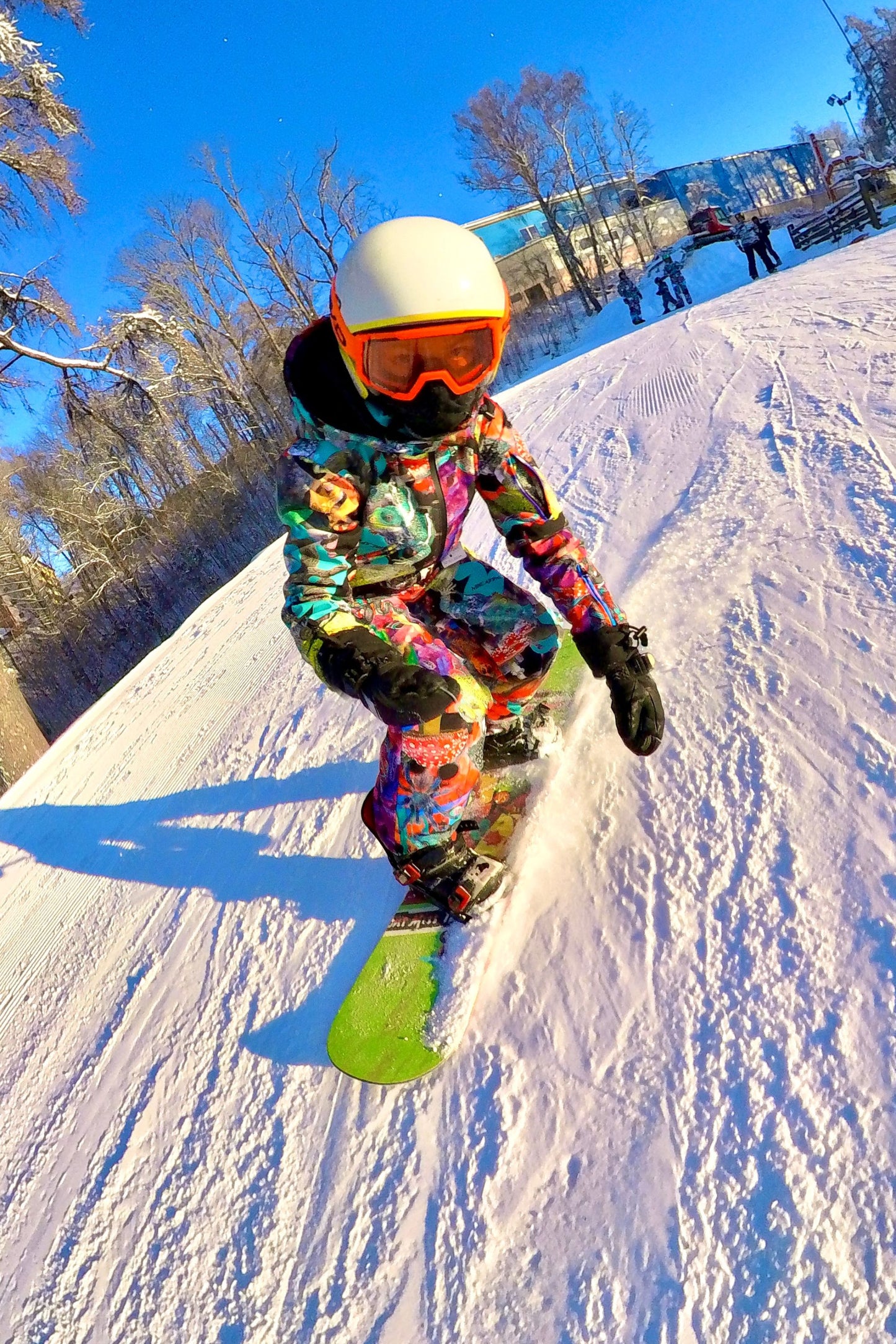 Bērnu ziemas slēpošanas/snovborda kombinezons raibās krāsās