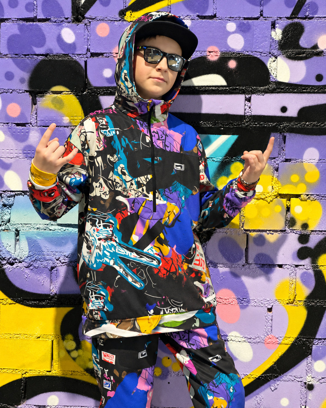 Child wearing MoveAddict Love and Peace print kids' oversized hoodie - portrait