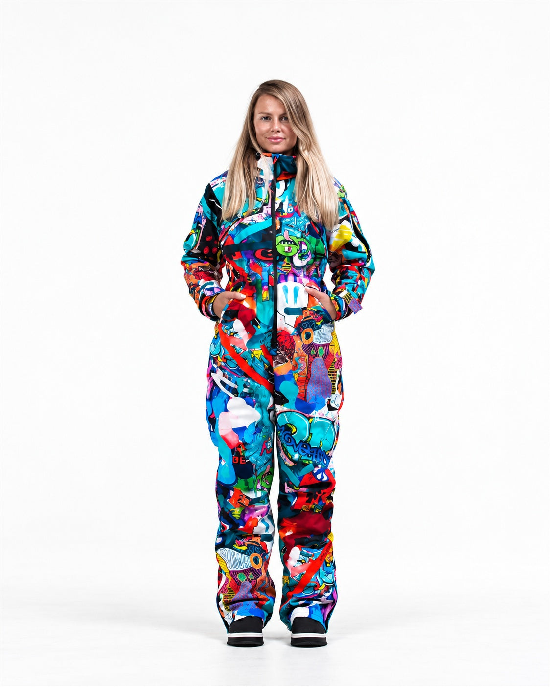 Woman wearing MoveAddict Monster Party print one-piece snowboard and ski suit – front view, studio photo