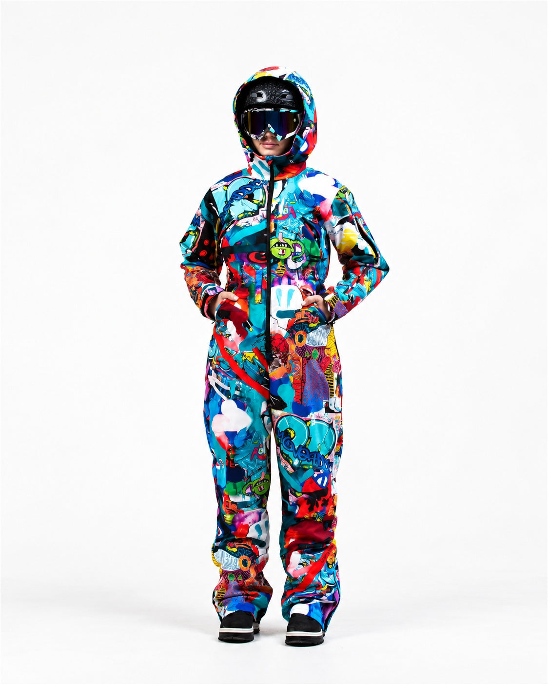 Woman wearing MoveAddict Monster Party print women's snowsuit with hood up and ski goggles – front view