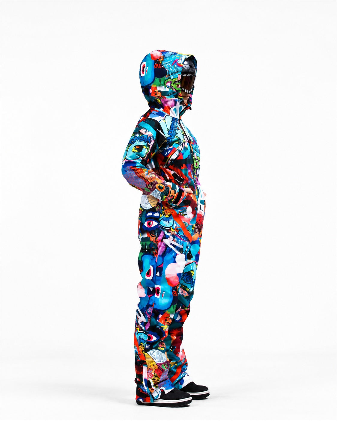 Woman wearing MoveAddict Monster Party print women's snowsuit with hood up – side view, photo 2