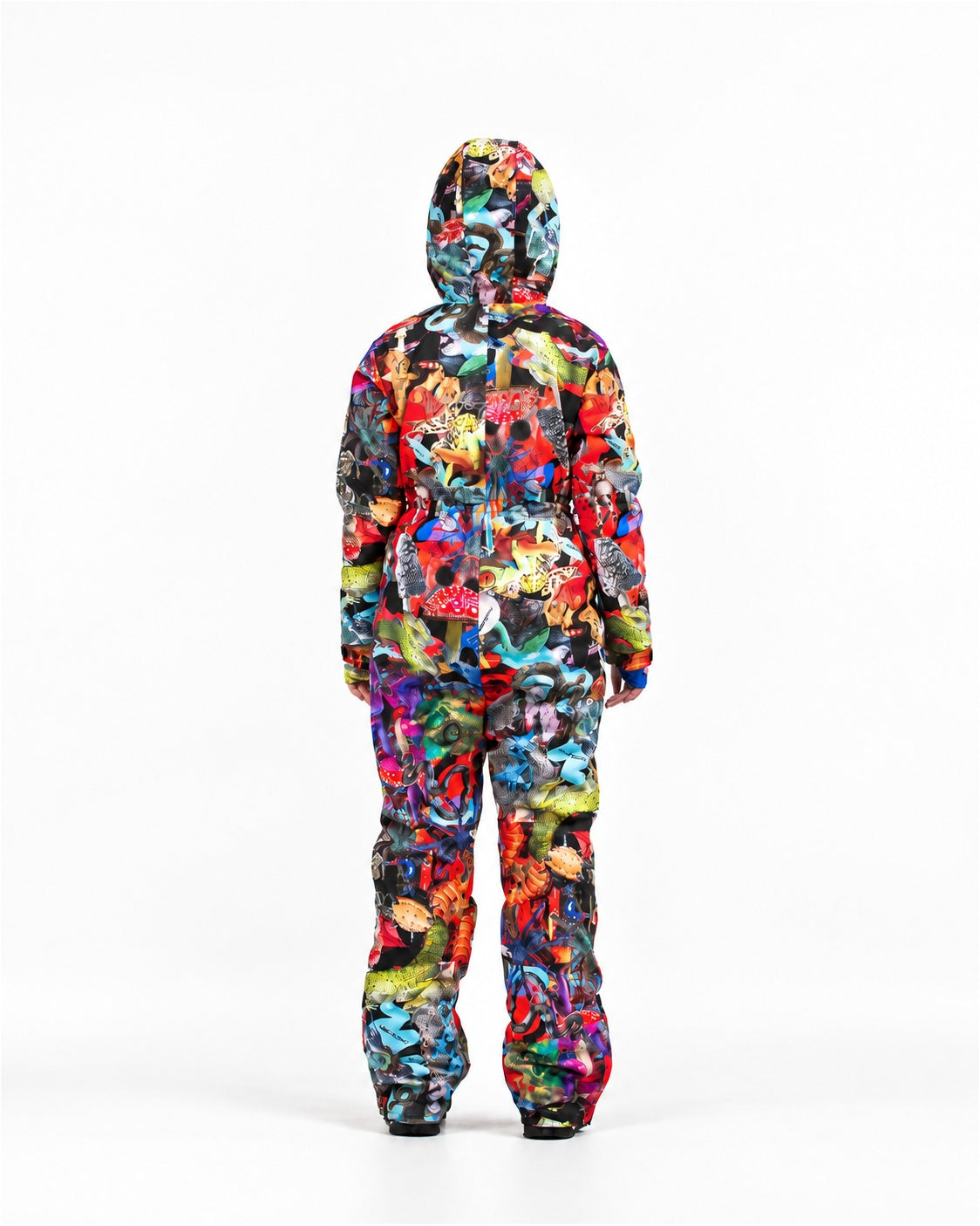 Woman wearing MoveAddict Mind Jungle print one-piece snowboard and ski suit – back view, studio photo