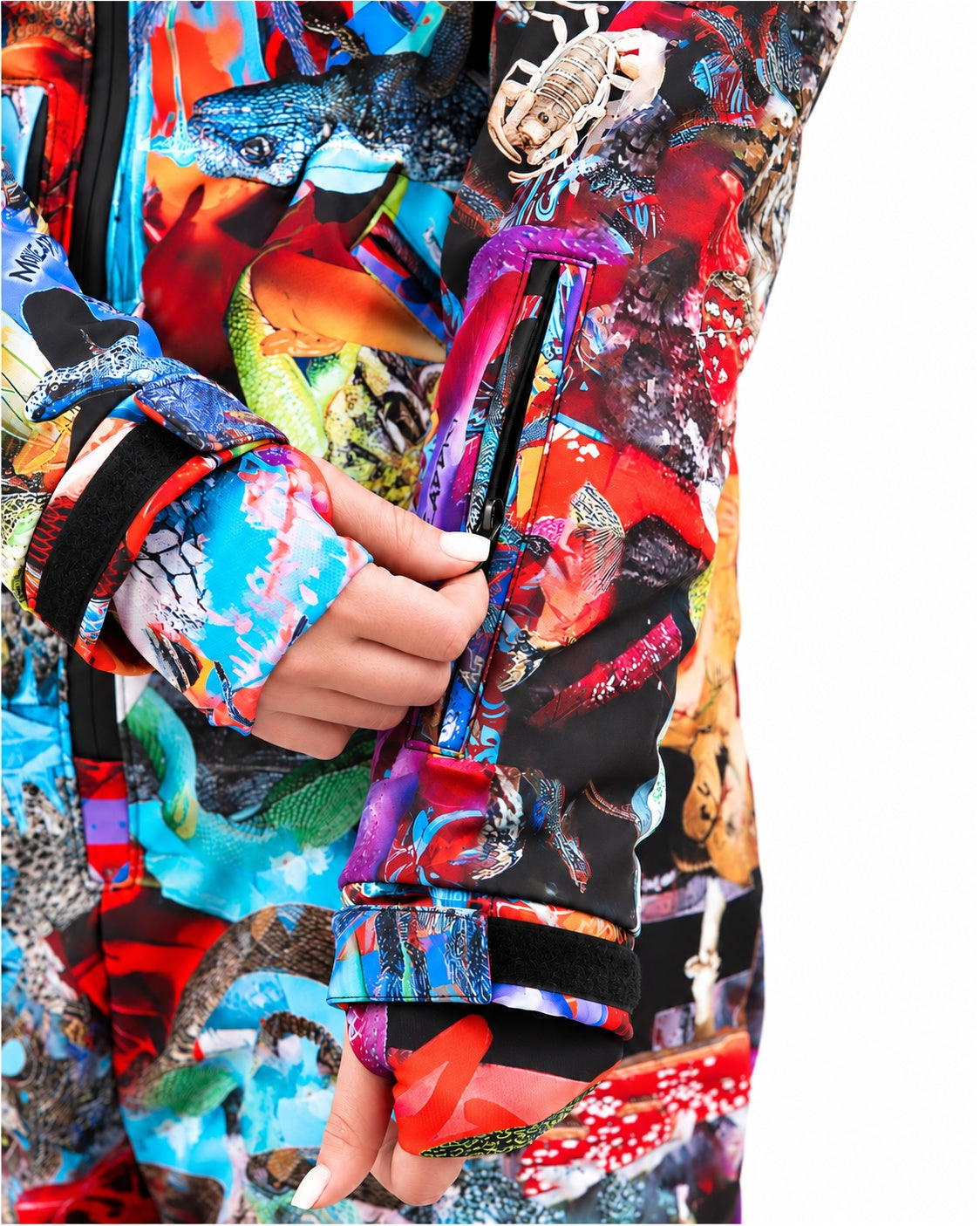 Sleeve cuff with hook-and-loop closure on MoveAddict Mind Jungle print women's snowsuit