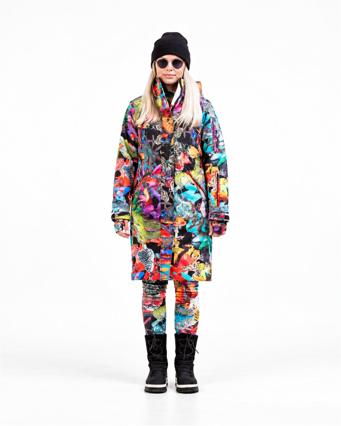 Woman wearing MoveAddict Mind Jungle print longline winter parka with matching leggings – front view