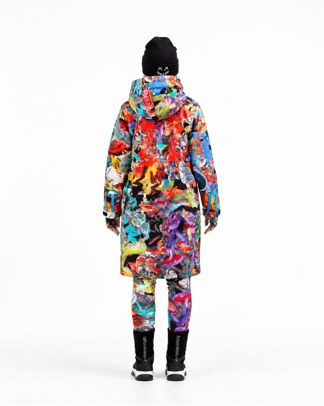 Woman wearing MoveAddict Mind Jungle print longline winter parka – back view