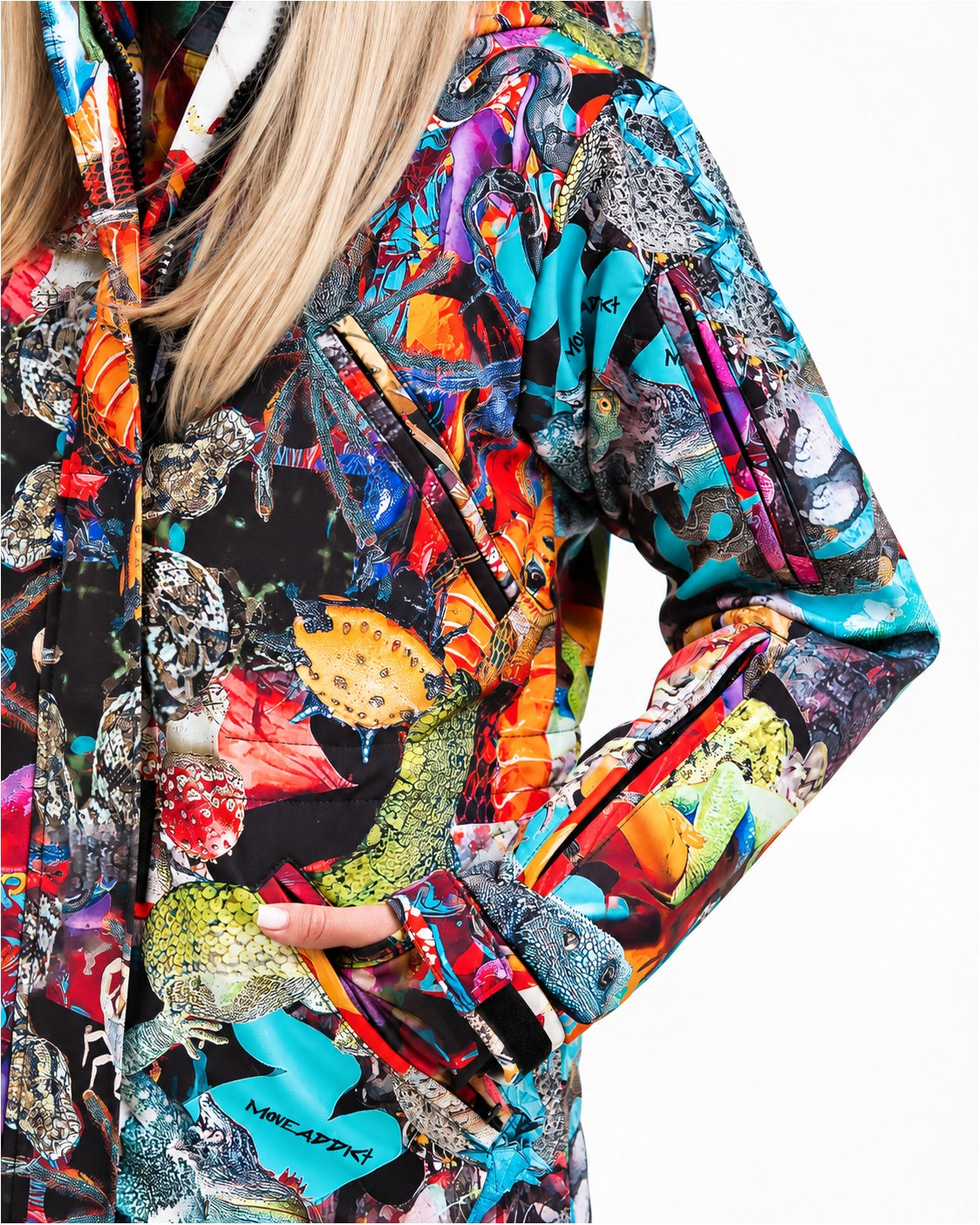 Zipped chest pockets on MoveAddict Mind Jungle print women's winter parka