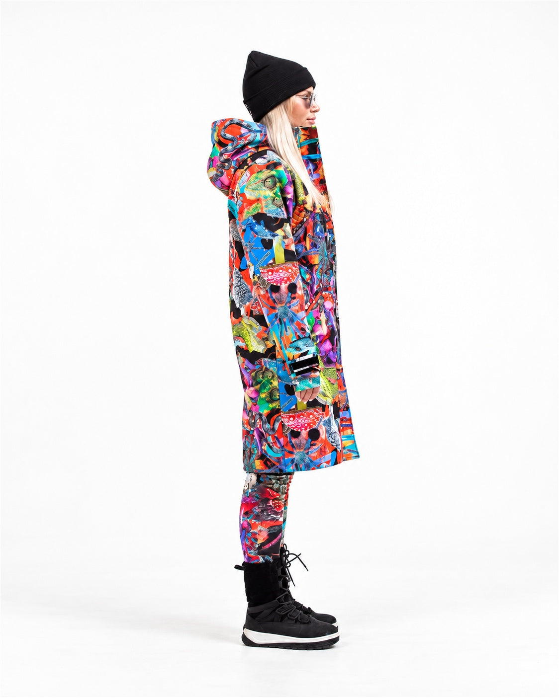 Woman wearing MoveAddict Mind Jungle print longline winter parka – side view