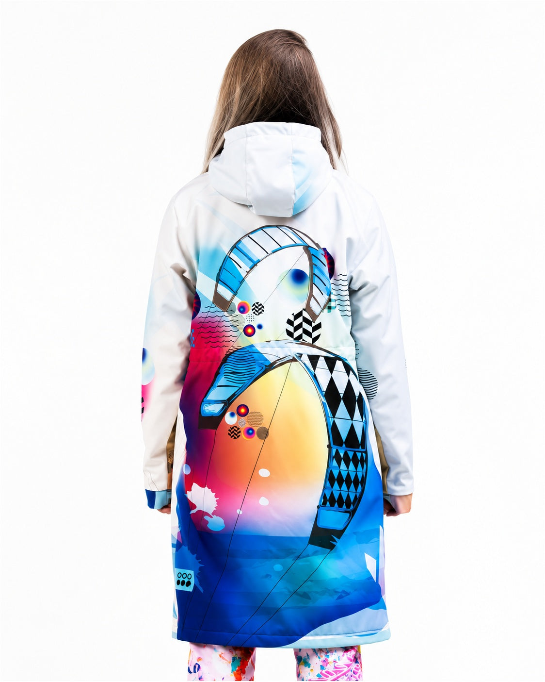 Woman wearing MoveAddict Kite print longline winter parka – back view with kitesurfing scene