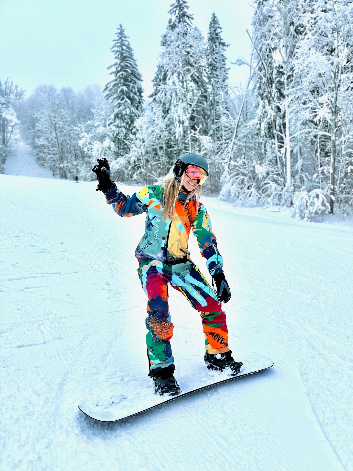 Women`s winter ski / snowboard suit with orange colors / Snowsuit