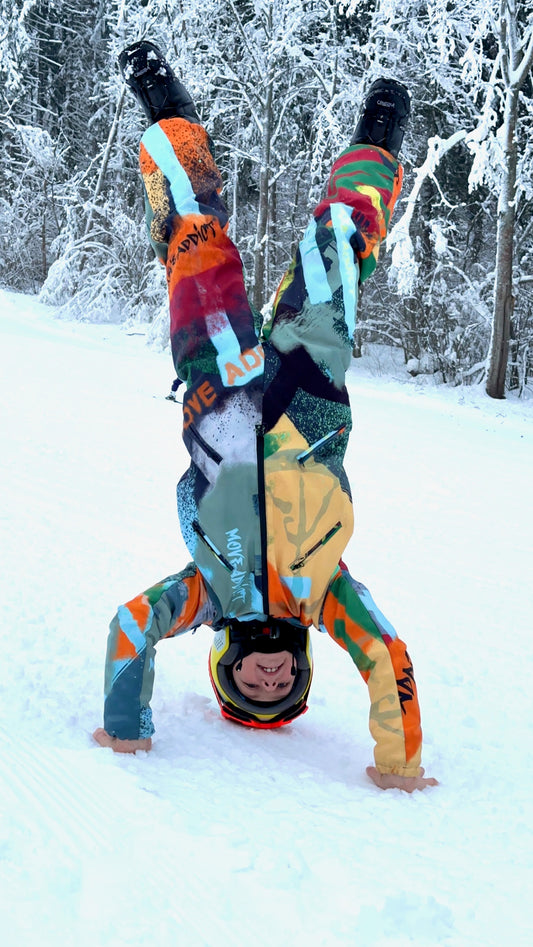 Bērnu ziemas slēpošanas/snovborda kombinezons oranžā krāsā