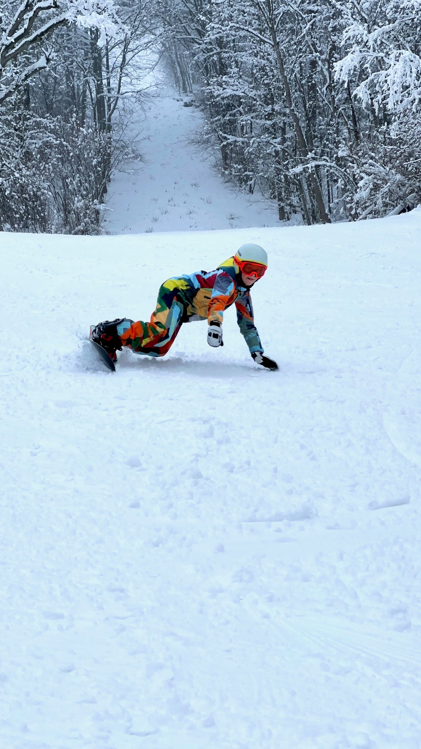 Bērnu ziemas slēpošanas/snovborda kombinezons oranžā krāsā