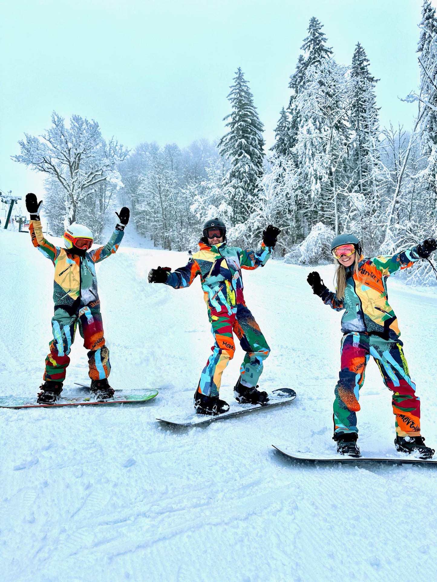 Ziemas slēpošanas/snovborda kombinezons oranžā krāsā