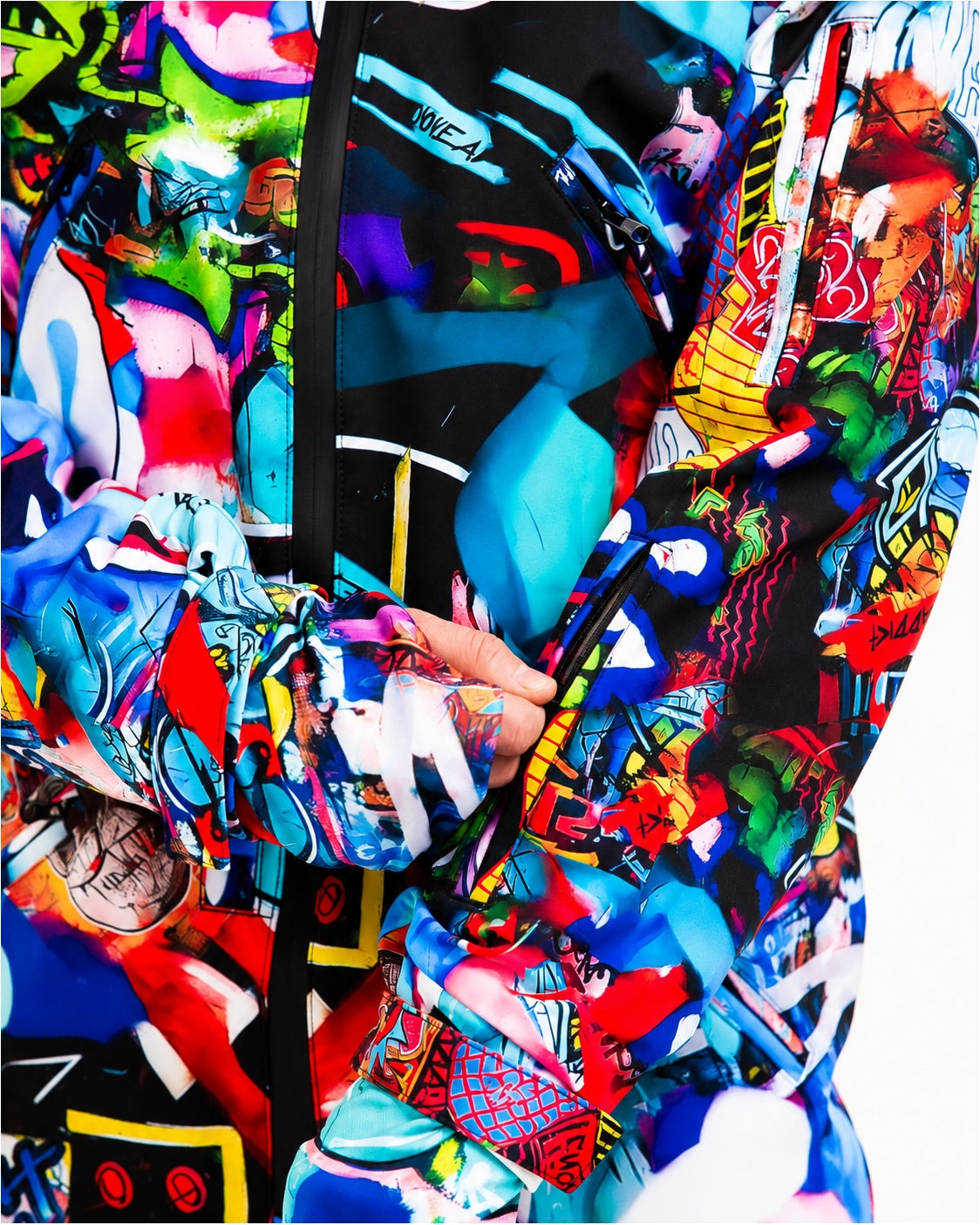 Zipped pocket close-up on MoveAddict Monster Party print men's snowsuit