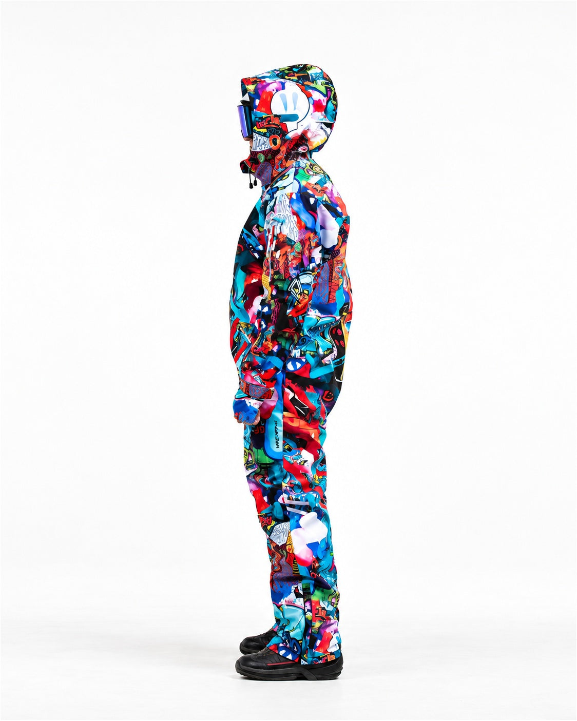 Man wearing MoveAddict Monster Party print one-piece snowboard and ski suit – side view