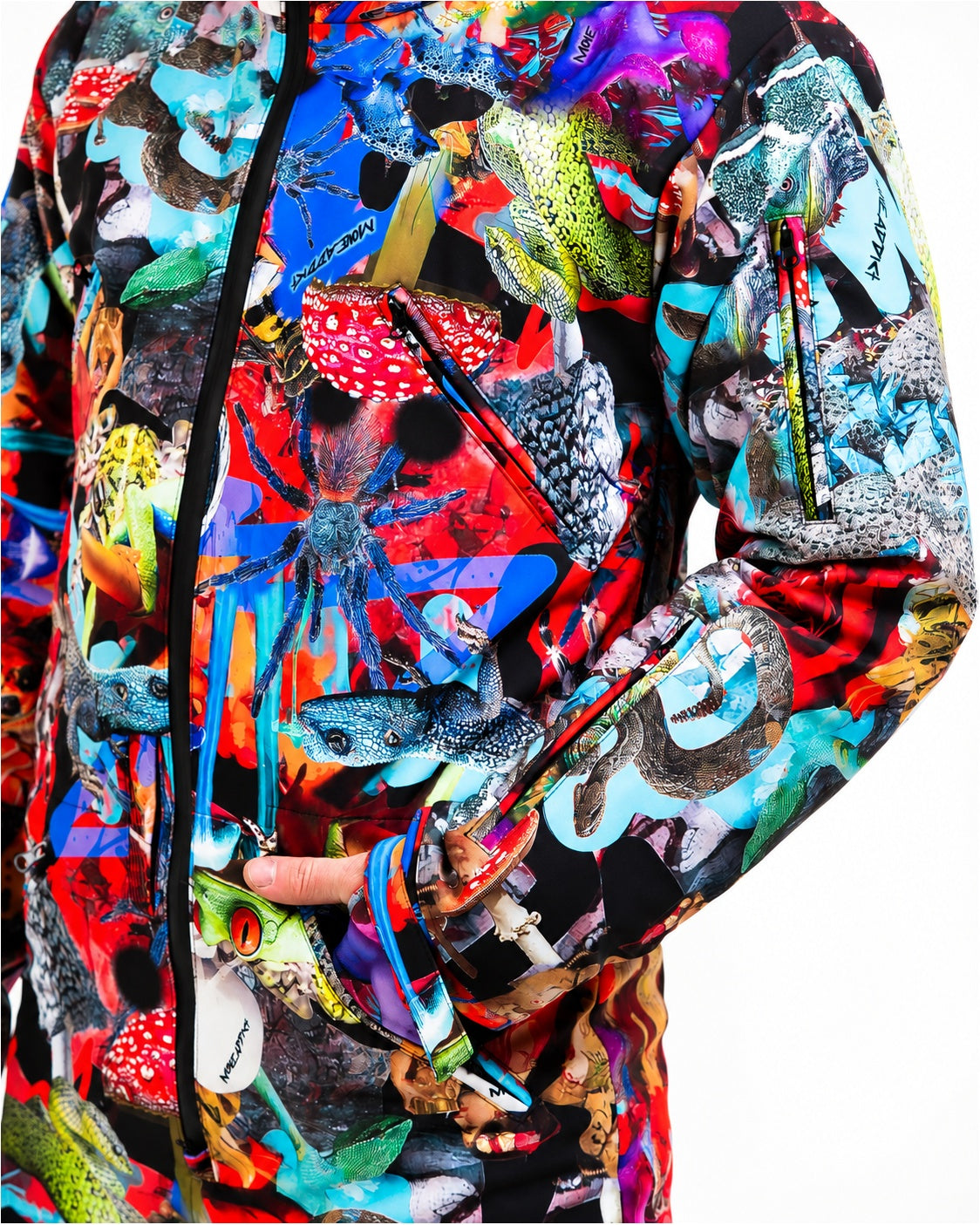Zipped chest pocket close-up on MoveAddict Mind Jungle print men's snowsuit