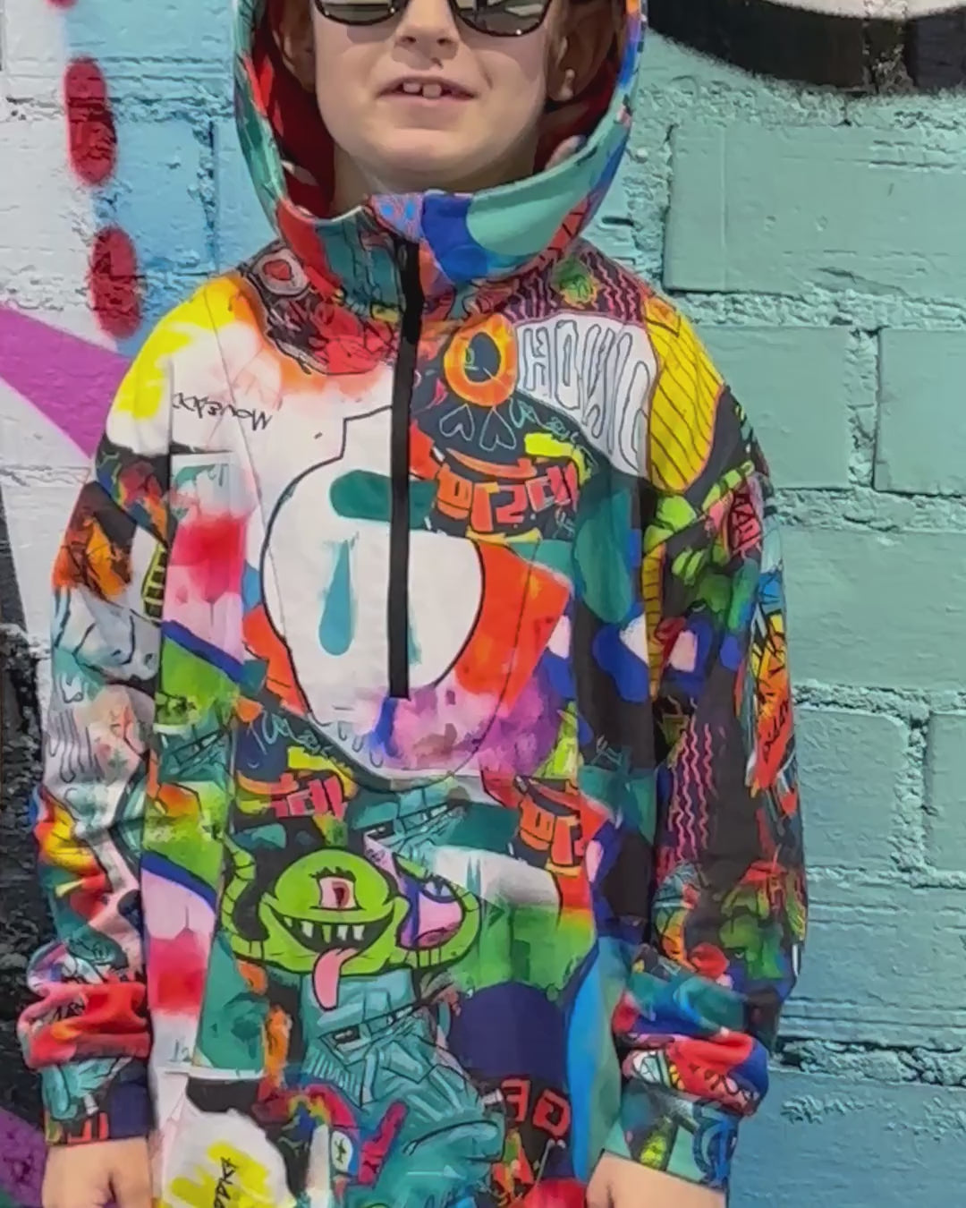 Boy wearing MoveAddict Monster Party print kids' joggers and hoodie — product video