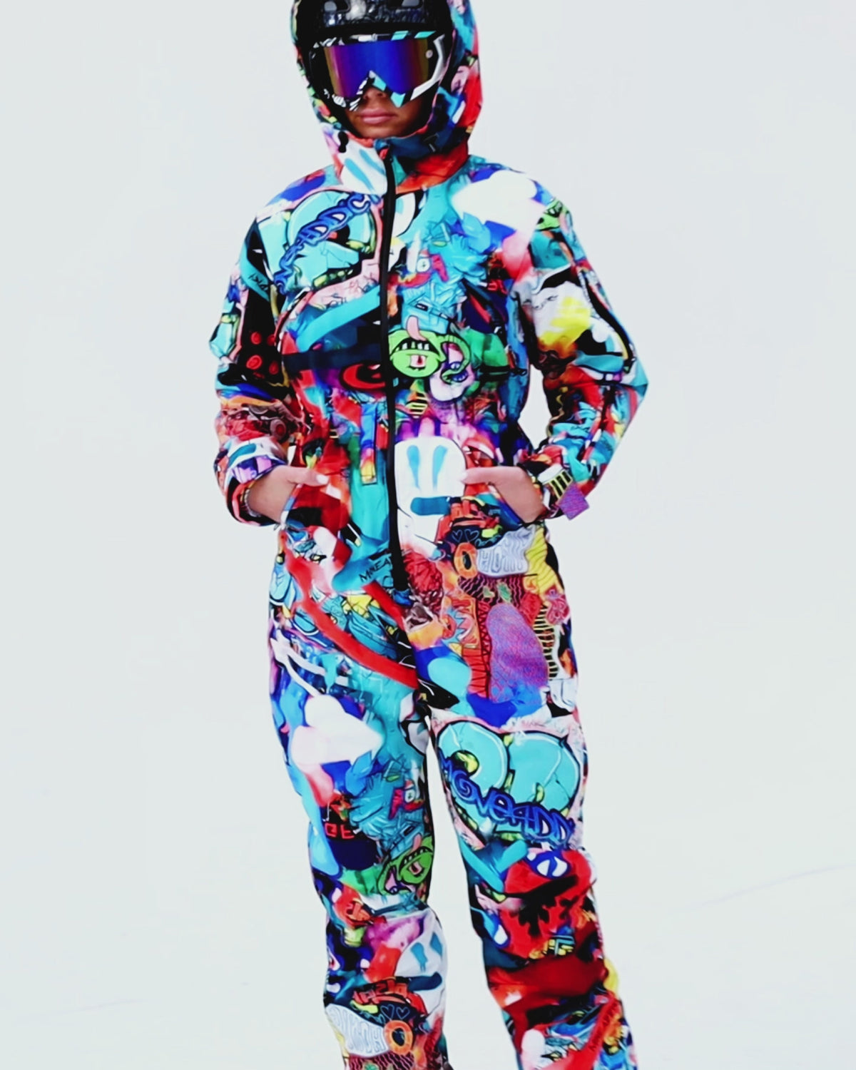 Woman wearing MoveAddict Monster Party print one-piece snowboard and ski suit - product video