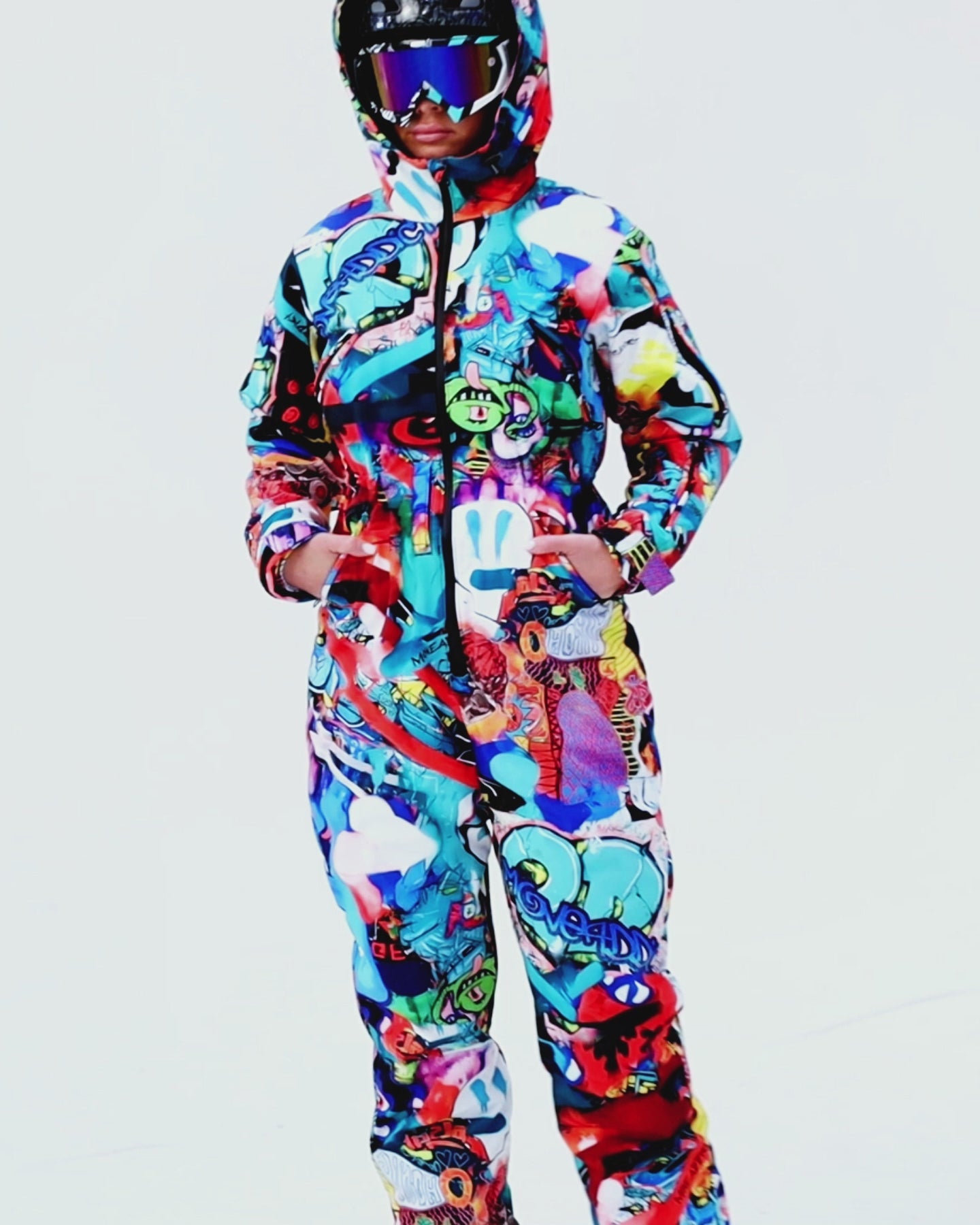 Woman wearing MoveAddict Monster Party print one-piece snowboard and ski suit - product video