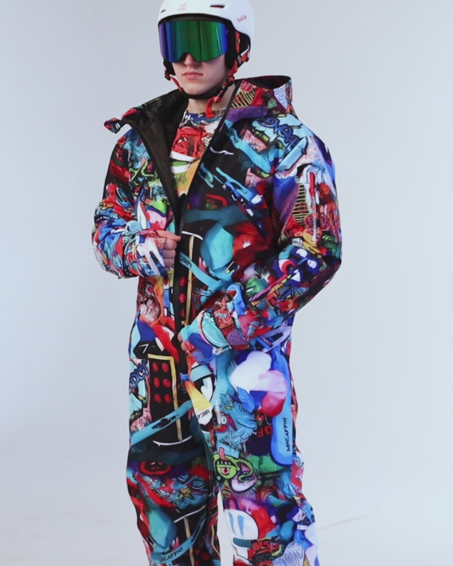 Man wearing MoveAddict Monster Party print one-piece snowboard and ski suit - product video