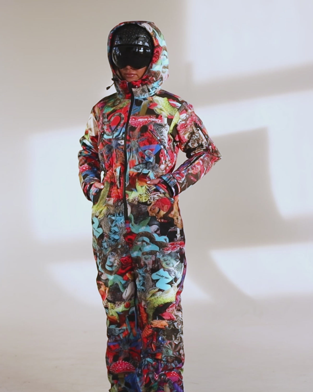 Woman wearing MoveAddict Mind Jungle print one-piece snowboard and ski suit - product video