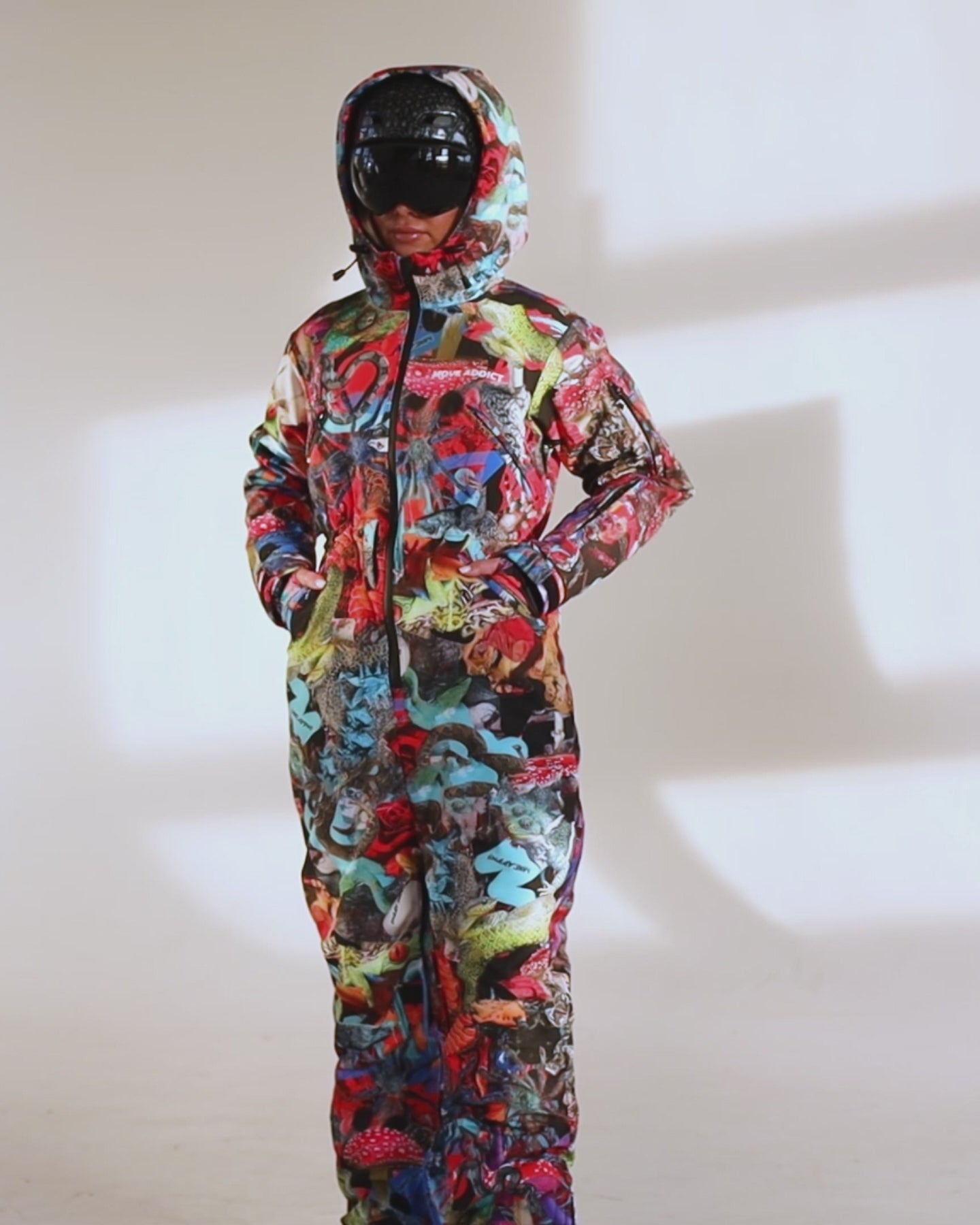 Woman wearing MoveAddict Mind Jungle print one-piece snowboard and ski suit - product video