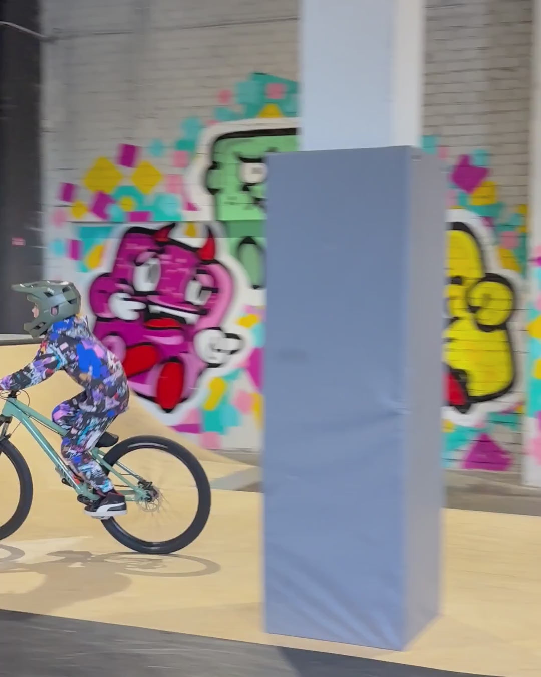 Kid riding a bike in MoveAddict Love and Peace print kids' joggers and hoodie — product video